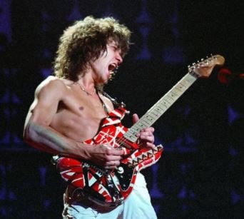 Eddie Van Halen with his legendary guitar